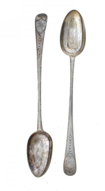 Appraisal: A PAIR OF GEORGE III GRAVY SPOONS bright cut Old