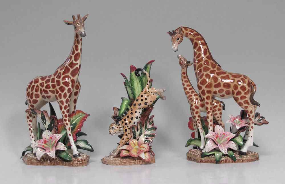 Appraisal: FRITZ AND FLOYD GIRAFFE JAGUAR FIGURINES To include Single Giraffe