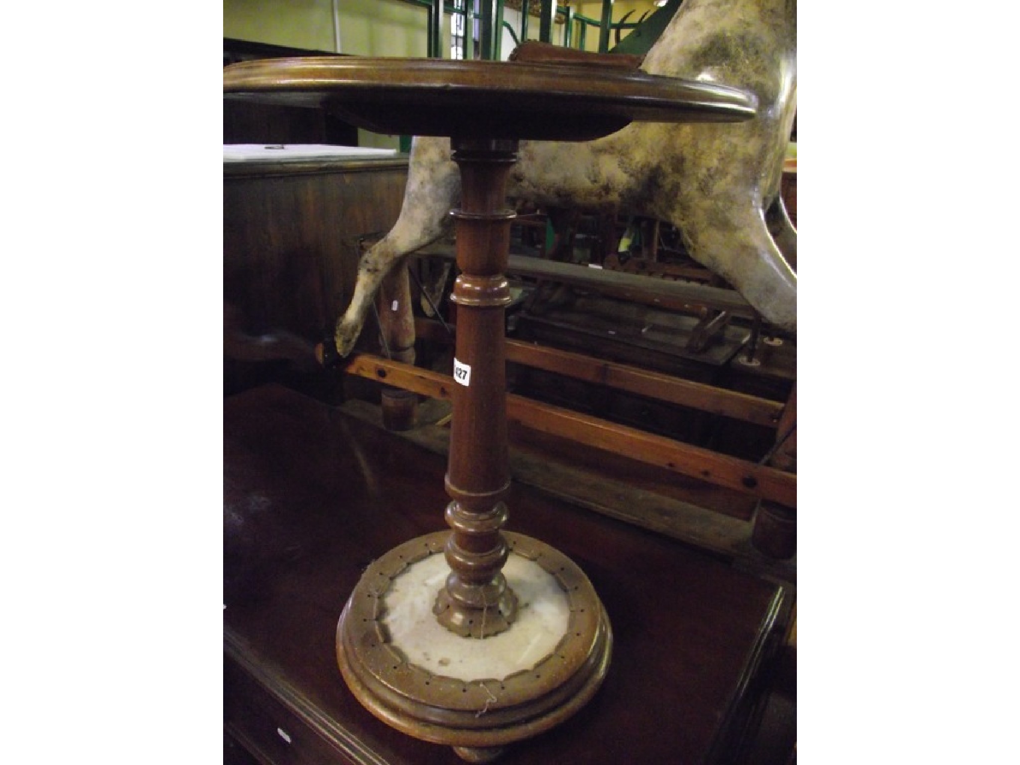 Appraisal: A Victorian mahogany occasional table the circular top raised on