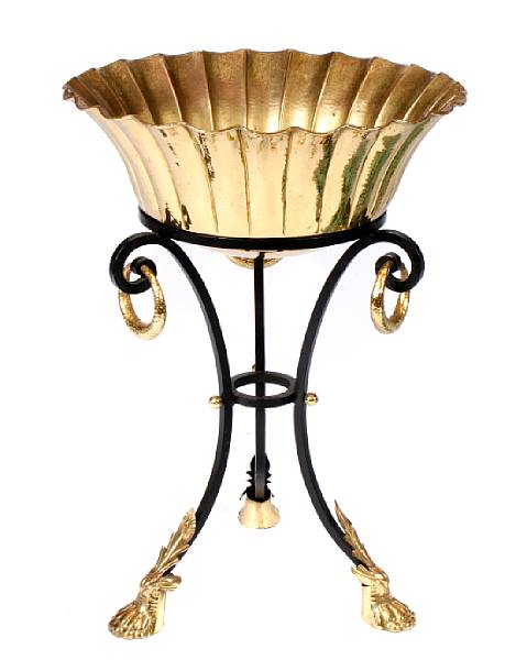 Appraisal: A cast metal and brass jardiniere height in diameter in