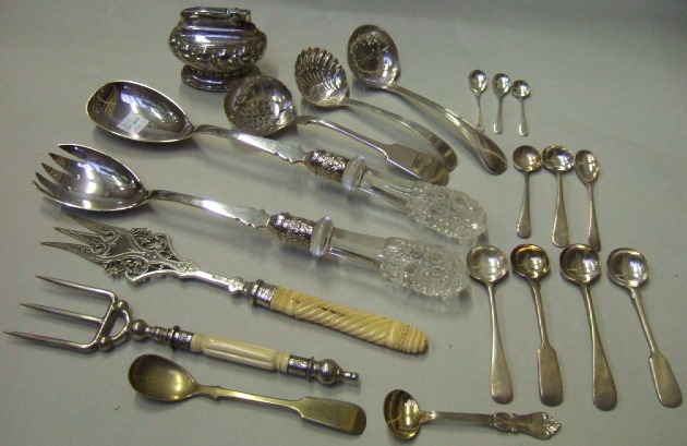 Appraisal: Plated wares comprising a pair of salad servers with faceted