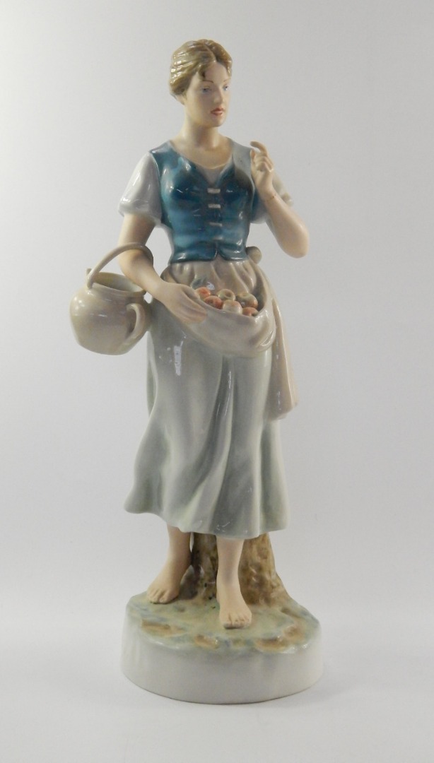 Appraisal: A Royal Dux porcelain figure of a peasant girl modelled