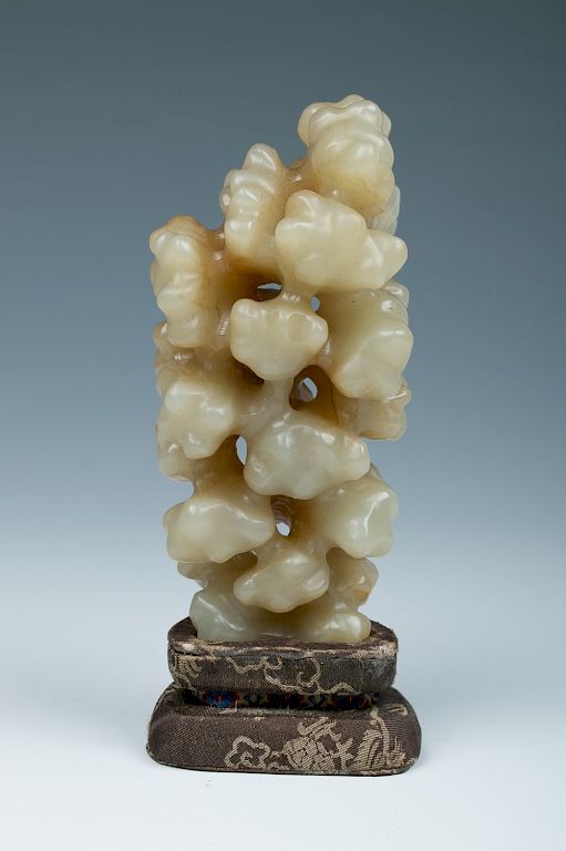 Appraisal: JADE SCHOLAR'S STONE QING Standing on a foot relatively narrower