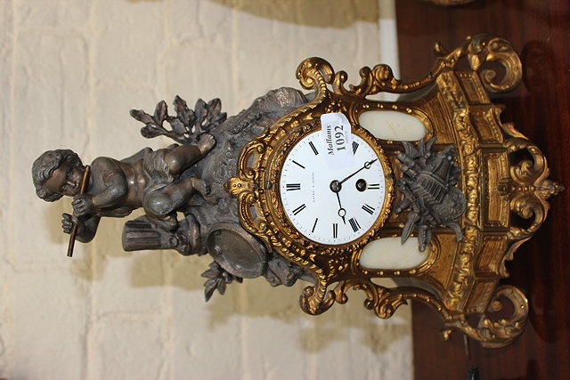 Appraisal: A TH CENTURY MANTLE TIMEPIECE the gilt metal case with