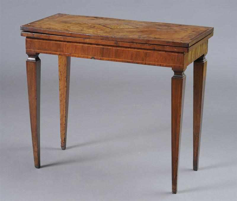 Appraisal: ITALIAN NEOCLASSICAL FRUITWOOD INLAID WALNUT GAMES TABLE The folding quarter-veneered