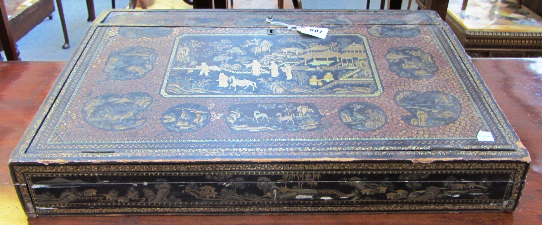 Appraisal: A large th century black lacquer chinoiserie decorated writing slope