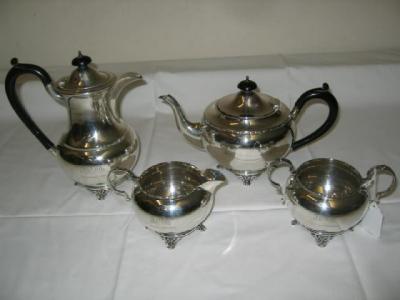 Appraisal: A FOUR PIECE TEA AND COFFEE SET of circular form