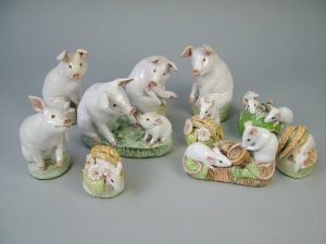 Appraisal: A selection of white glazed terracotta pigs piglets and field