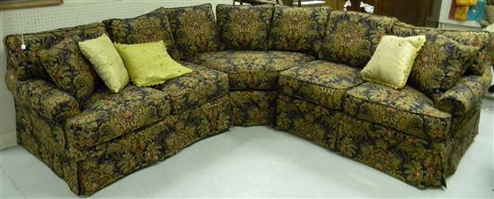 Appraisal: Corner sofa with high end custom slip cover polychrome pattern