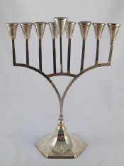 Appraisal: An Israeli sterling silver menorah in the Art Deco manner