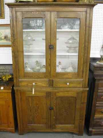 Appraisal: Victorian Oak Cupboard double glass doors above two drawers and