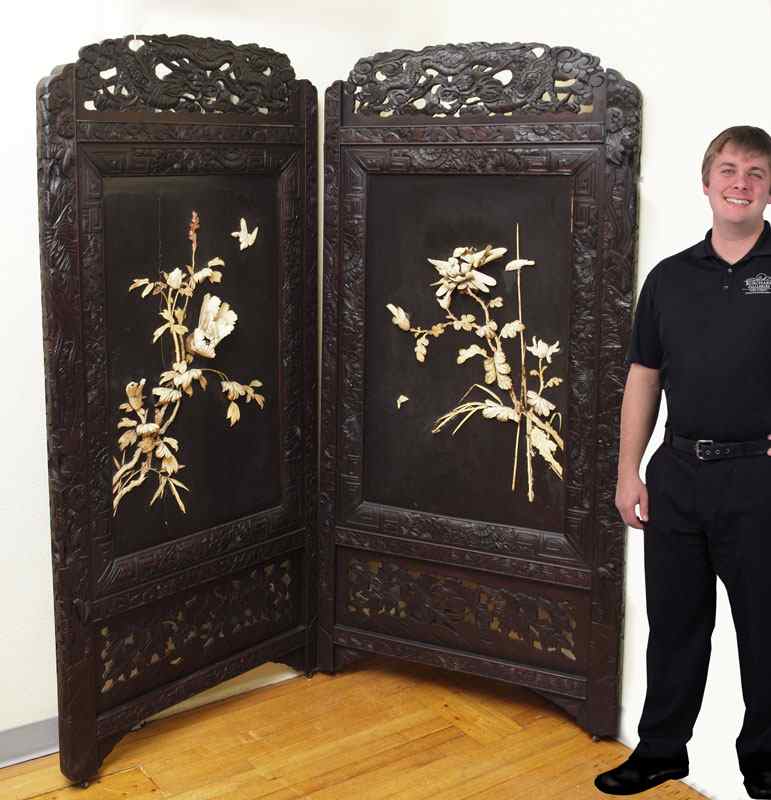 Appraisal: TWO CHINESE CARVED PANELS WITH APPLIED BONE Elaborate carvings frame