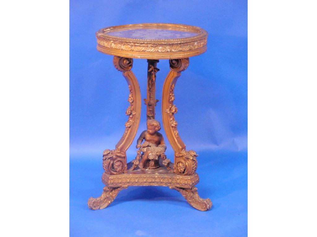 Appraisal: A French Regence style gilt gesso circular pedestal table with