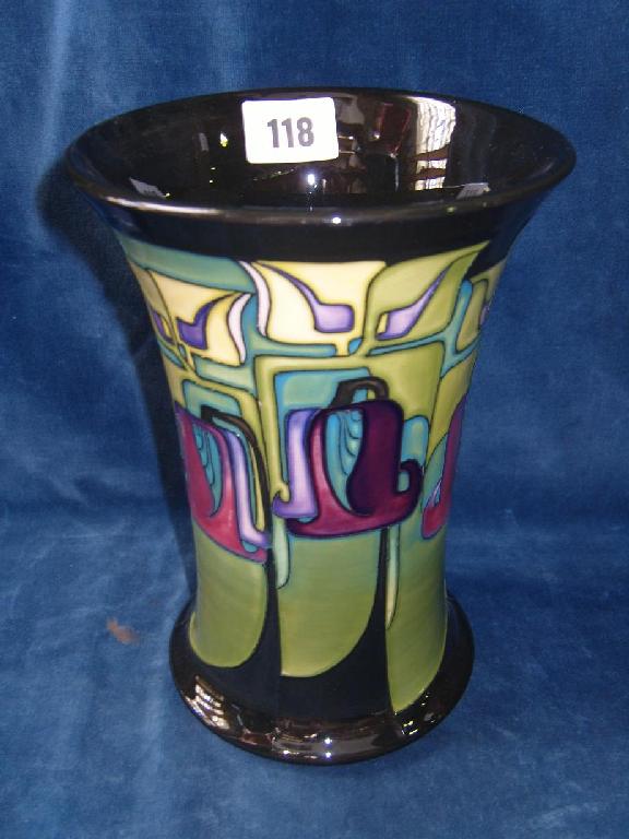 Appraisal: A Moorcroft vase of flared cylindrical form in the Emerald