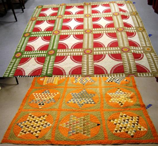 Appraisal: Two quilts one brown red and green with sun bursts