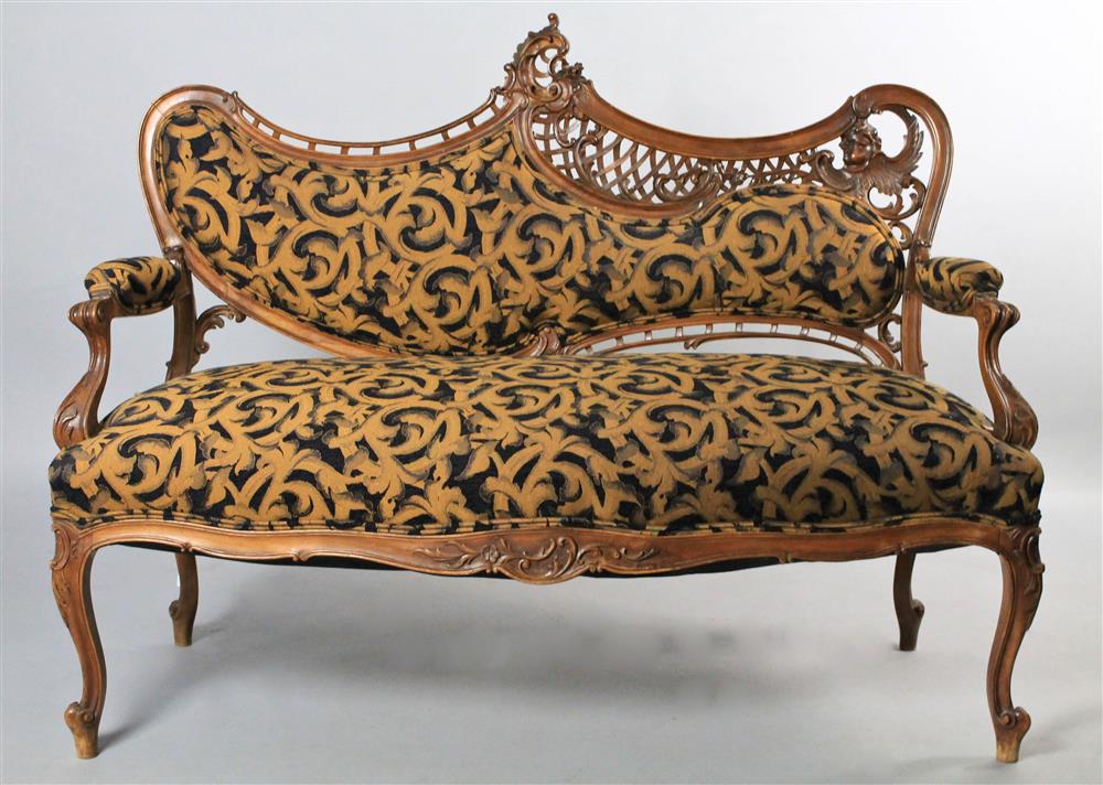 Appraisal: ROCOCO REVIVAL CARVED FRUITWOOD SETTEE WITH BLACK AND GOLD SCROLLED