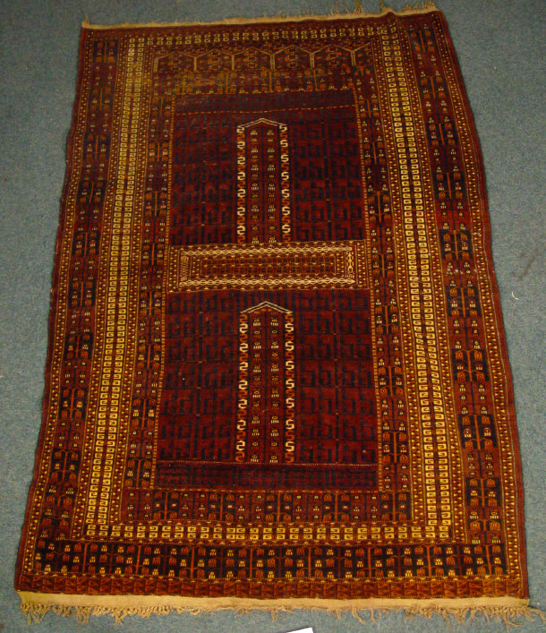 Appraisal: Rectangular brown ground rug decorated with a cream orange and