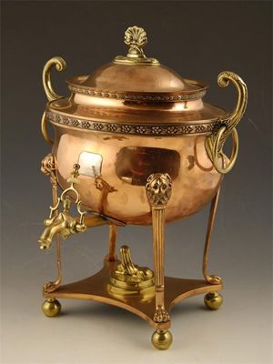 Appraisal: A Regency copper and brass samovar with an applied silver