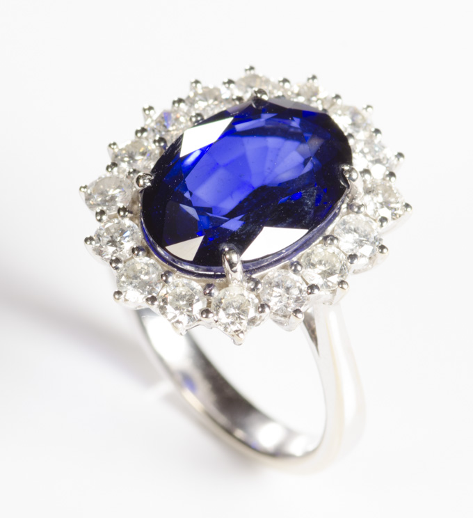 Appraisal: SAPPHIRE DIAMOND AND FOURTEEN KARAT WHITE GOLD RING with round