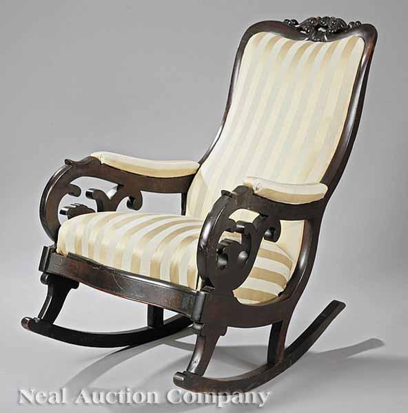 Appraisal: An American Mahogany Rocking Chair th c foliate crest rail