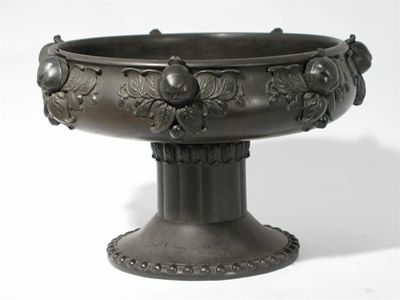 Appraisal: A Wedgwood black basalt centrepiece designed by Paul Follot modelled