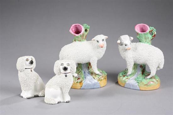 Appraisal: FOUR PIECES OF STAFFORDSHIRE All with sanded decoration Two sheep