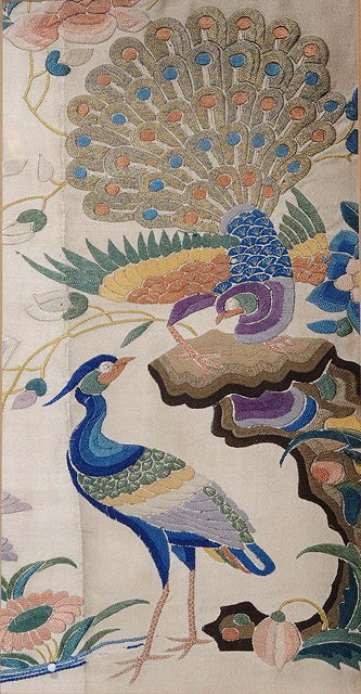 Appraisal: Three framed Chinese embroidered panelscirca peacock flowers and exotic birds