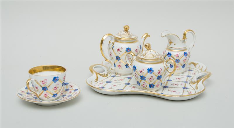 Appraisal: PARIS PORCELAIN SIX-PIECE BREAKFAST SET Unmarked with gilt trellis and