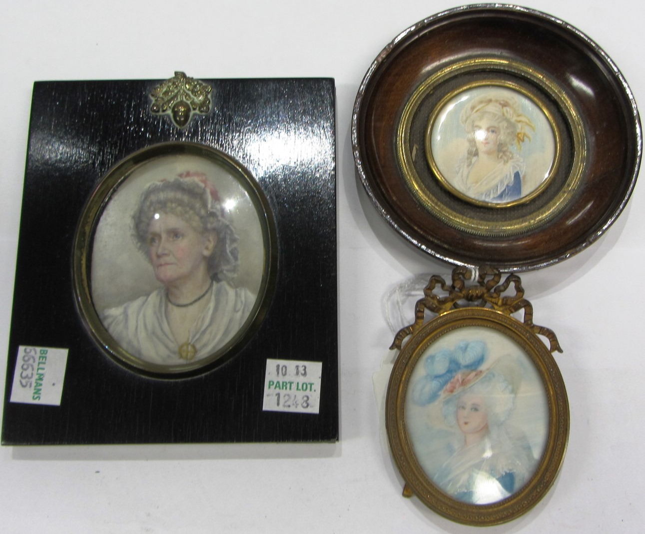 Appraisal: An oval portrait miniature of a lady wearing a bonnet