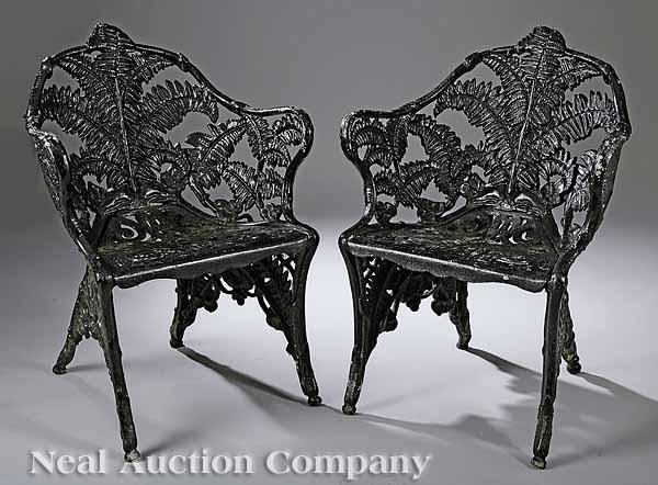 Appraisal: A Pair of Fern Pattern Cast Iron Garden Chairs after