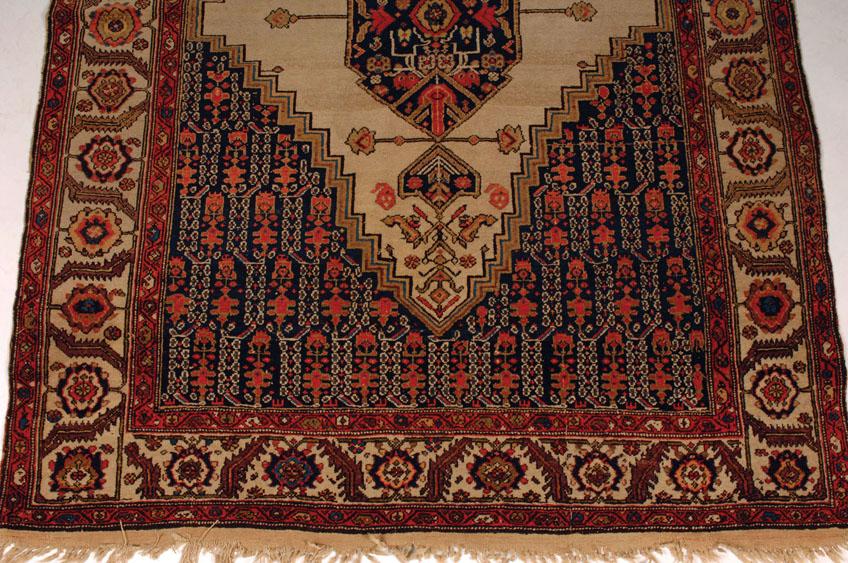 Appraisal: A NORTH WEST PERSIAN RUG the ivory field with a