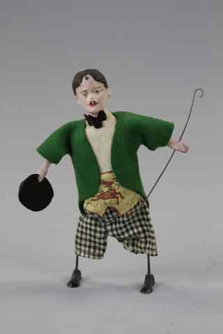 Appraisal: CHARLIE CHAPLIN WALKING FIGURE C made by Ferguson Novelty Co