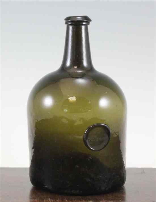 Appraisal: A black glass sealed wine bottle c with squat cylindrical