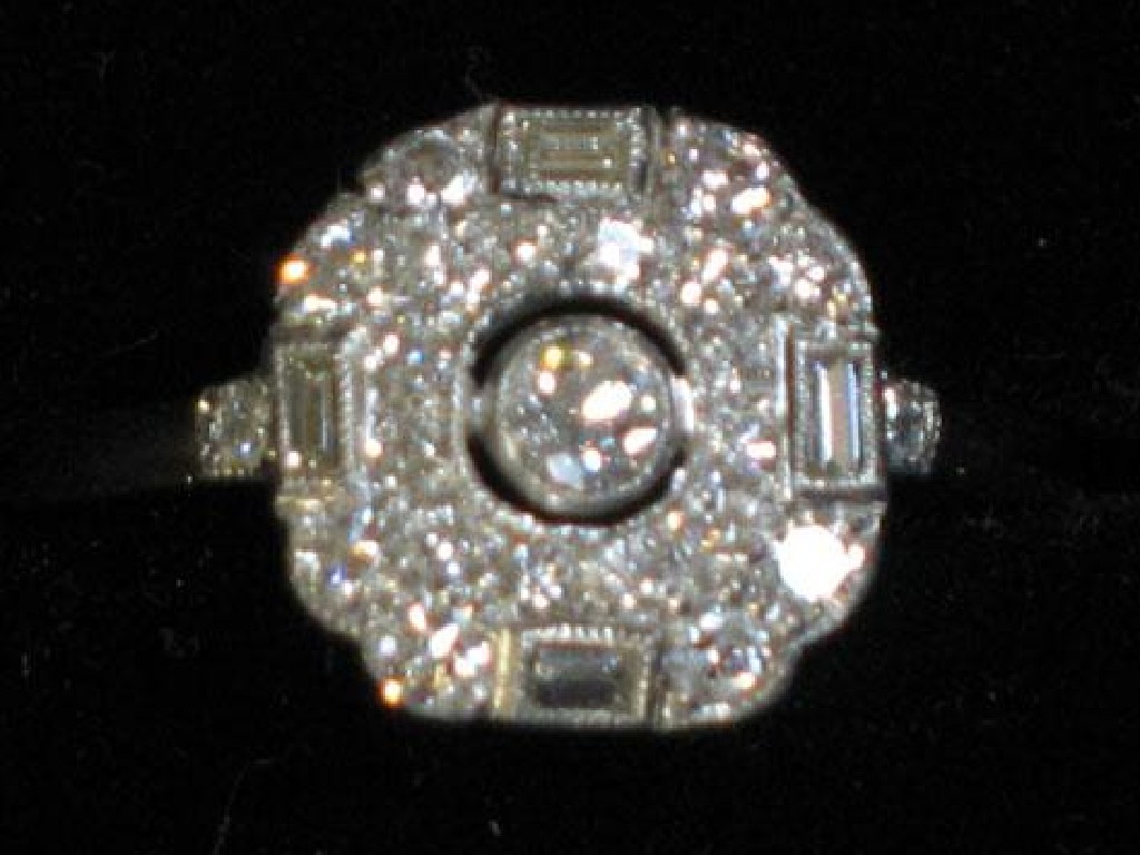 Appraisal: AN ART DECO STYLE DIAMOND RING in the form of