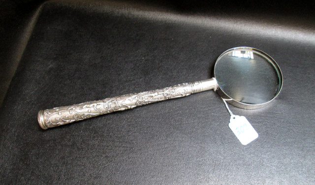 Appraisal: FINE SILVER LONG HANDLED MAGNIFYING GLASS attributed to Dutch school