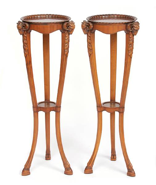 Appraisal: A pair of English style pedestals with figural rams heads