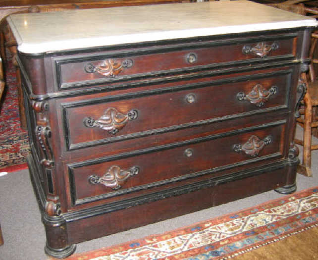 Appraisal: AMERICAN ROCOCO REVIVAL MAHOGANY DRESSER Having an arched mirror with