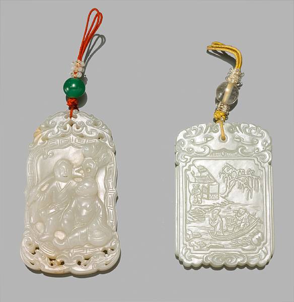 Appraisal: Two white jade pendants The first carved in low relief