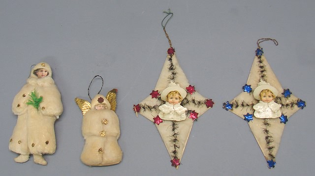 Appraisal: - Cotton batting scrap ornaments Pair of antique star shaped