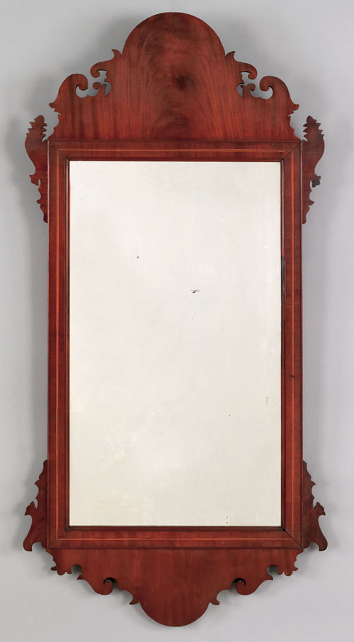 Appraisal: Chippendale mahogany looking glass ca with scrolled crest and base