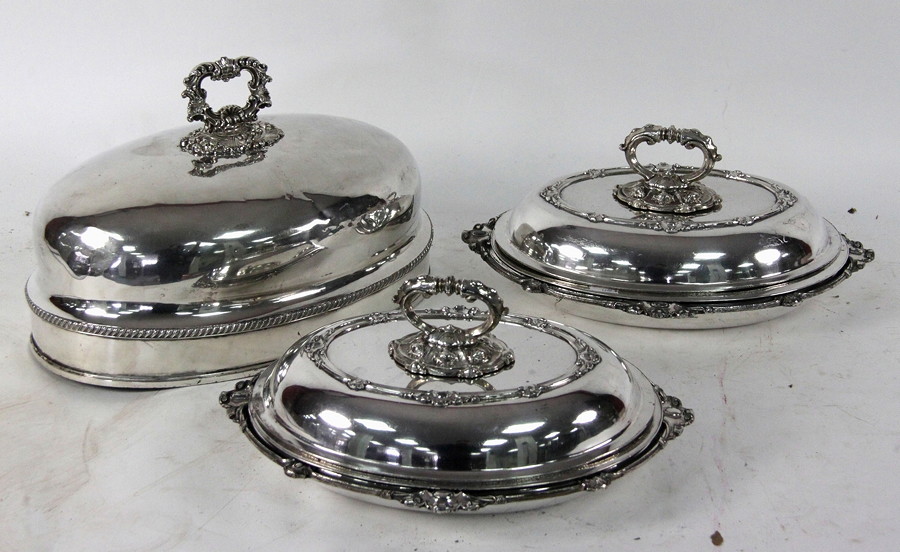 Appraisal: A pair of silver plated entree dishes of oval form