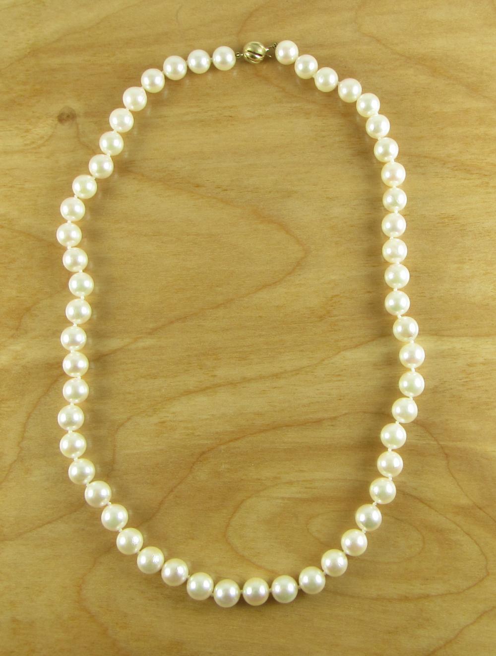 Appraisal: PEARL NECKLACE WITH APPRAISAL an princess-length necklace of round pearls