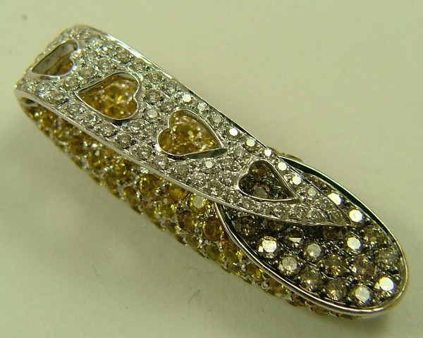 Appraisal: DIAMOND AND YELLOW GEMSTONE PENDANT K white gold pave set