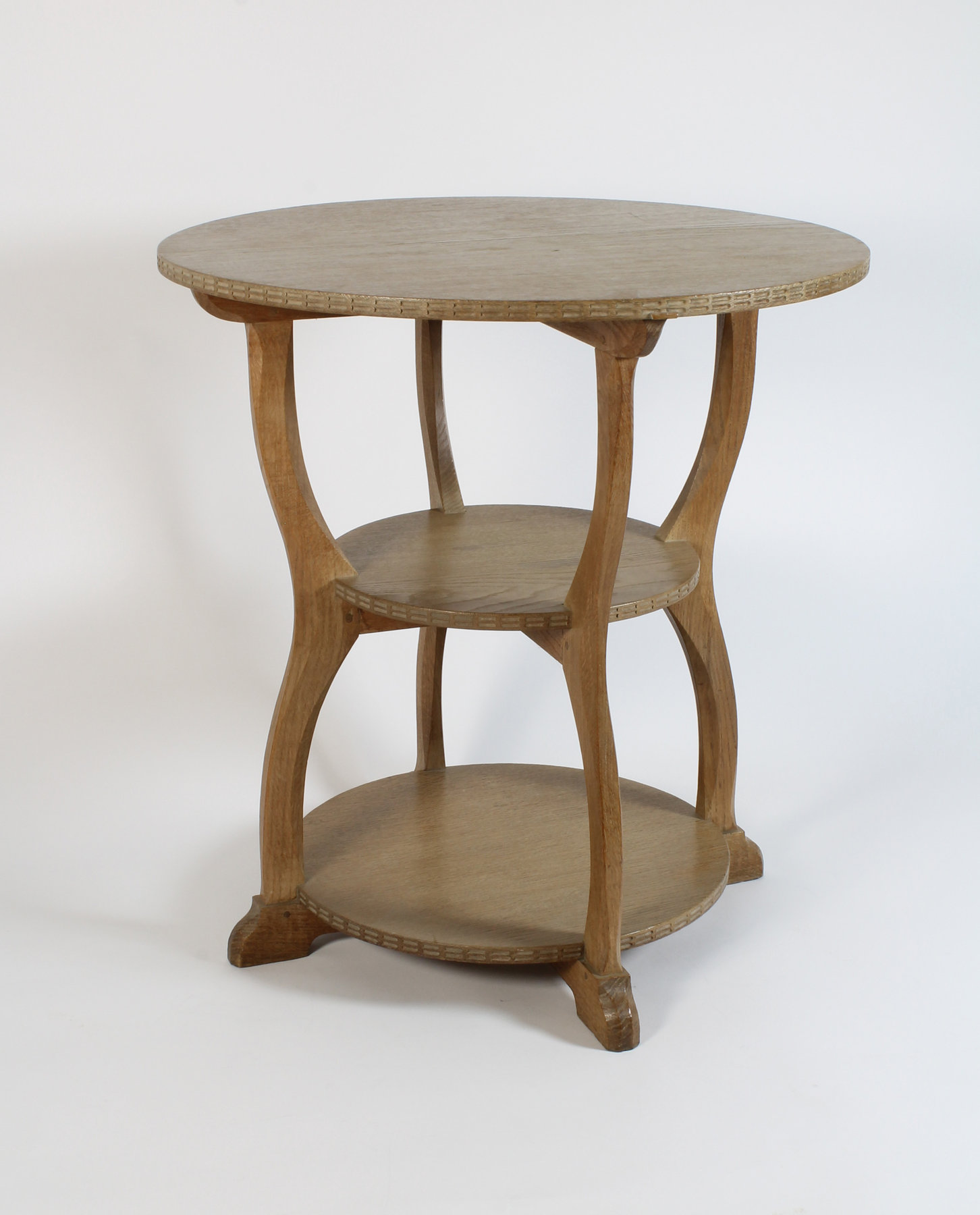 Appraisal: An oak occasional table by Peter Waals with circular top