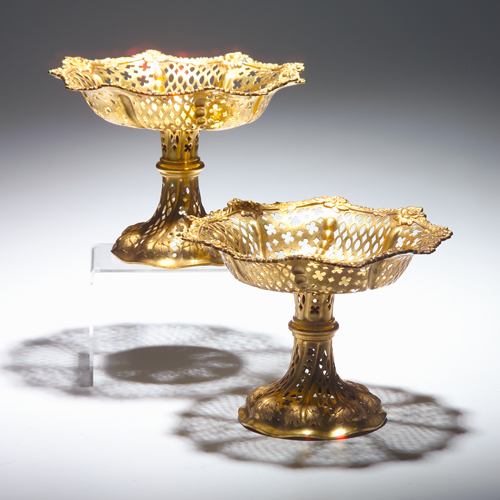 Appraisal: Pair of raised bowls of reticulated brass with incised center