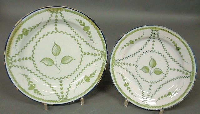 Appraisal: Two English Delft plates c with green floral patterns from