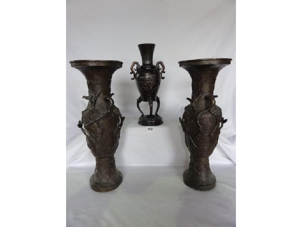 Appraisal: A pair of th century Japanese bronze vases with applied