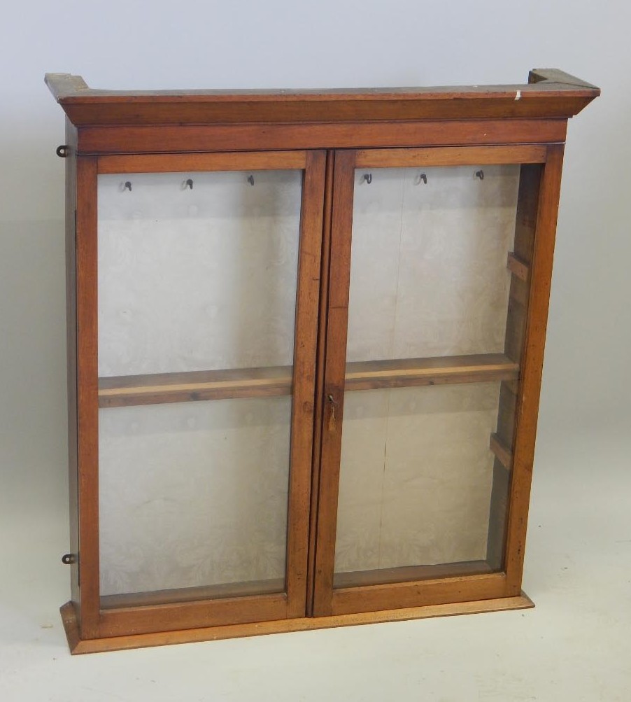 Appraisal: A thC mahogany display cabinet with two glazed doors the