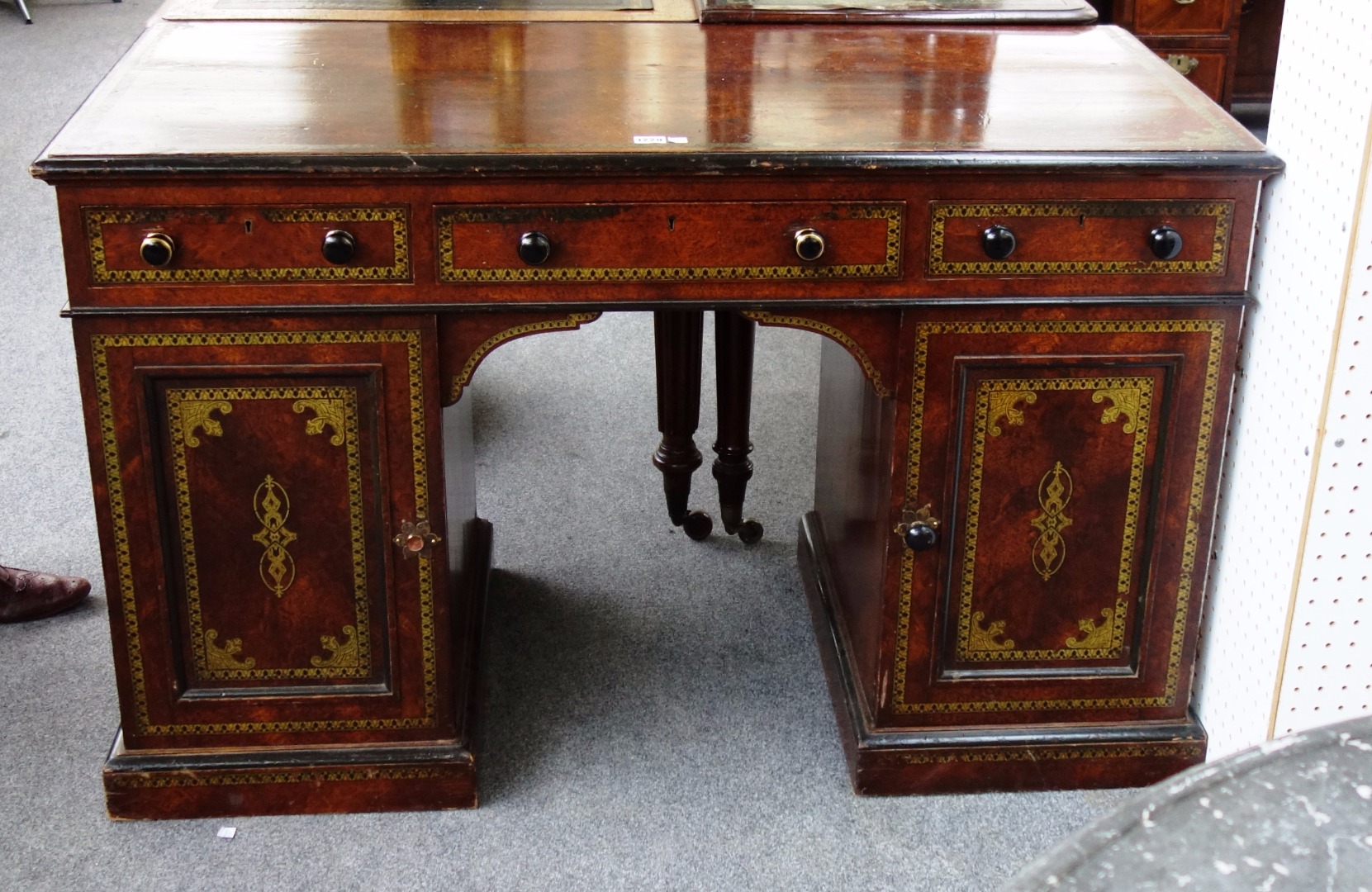 Appraisal: A th century faux amboyna parcel gilt painted pedestal desk