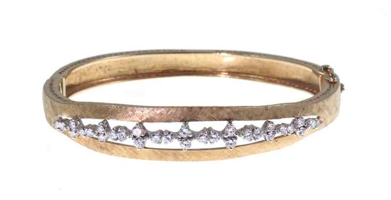 Appraisal: KT DIAMOND BANGLE BRACELET Yellow k gold in a brushed